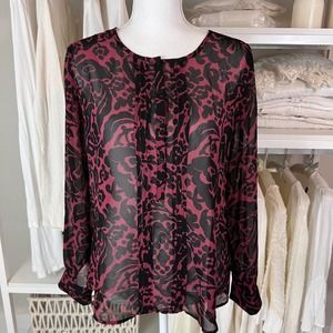 Ann Taylor Loft. Women's Long sleeved Top.  Sheer. Women's small Item #0150